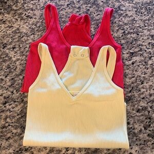 2 nwot Aura brand one size body suits!